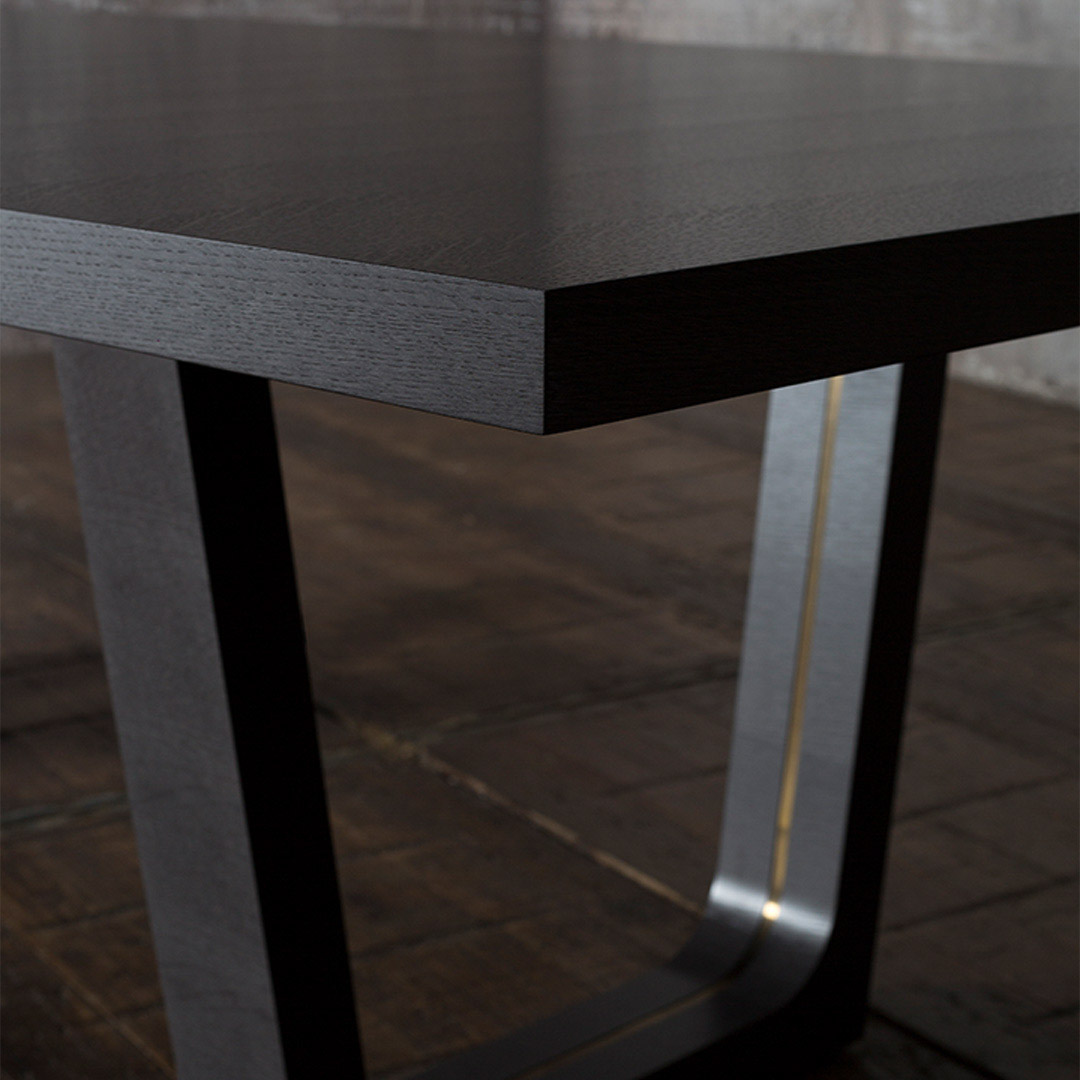 The Olympia Dining Table Detail image in dark tinted oak with a