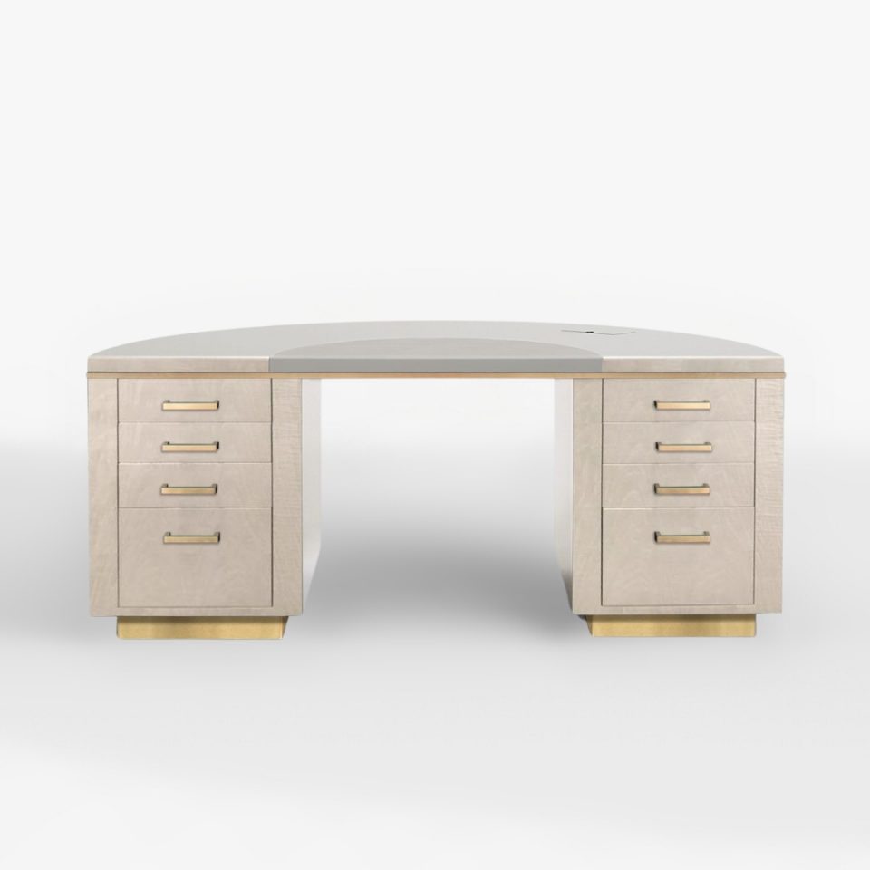 a sleek desk in a light timber veneer, with brushed brass accents all on a grey background with a soft shadow